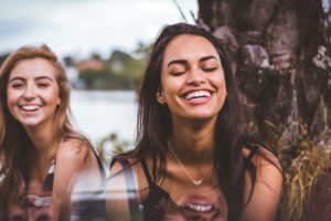 invisalign beautiful smile girls | North Vancouver dentist | Peak Dental Arts