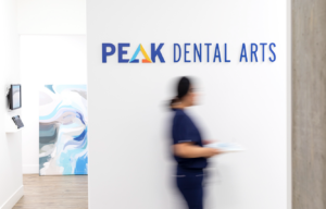 Dental Veneers vs. Implants: Pros and Cons | Peak Dental Arts